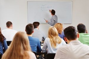 http://www.dreamstime.com/stock-images-teacher-whiteboard-class-teaching-business-studies-university-image29748764